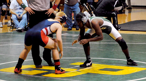 Wrestlers fight to move on at district tournament