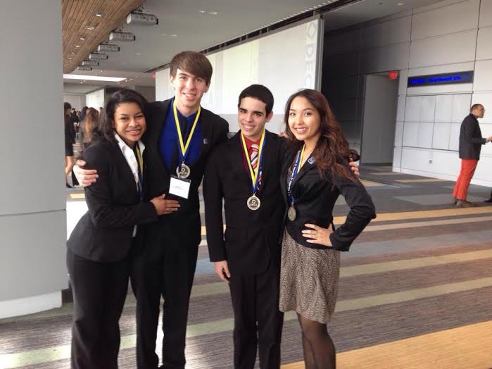  From left to right: Madison Kirkland, Joey Reierson , Neftali Rosado, and Vivian Lam, after their competition wins. 
Photo provided by Vivian Lam. 