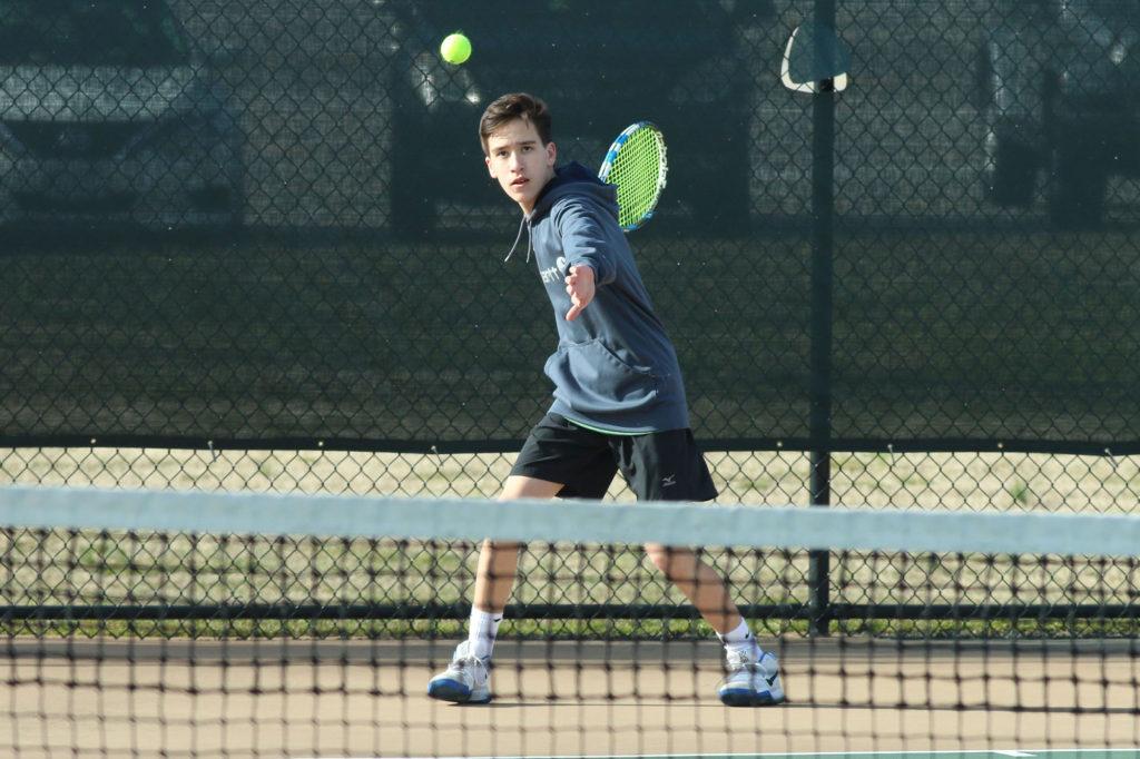 Junior Max Bennett warms up against Matoaca. Bennett is the number one seed for boys tennis this year. Photo by Royals Media.
