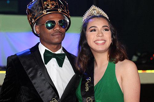 Prom King Jajour Lambert and Prom Queen Genesis Sanchez posed for pictures after being announced king and queen at the dance on Saturday night at the Old Towne Civic Center in Petersburg. Photo by Annie Lin.