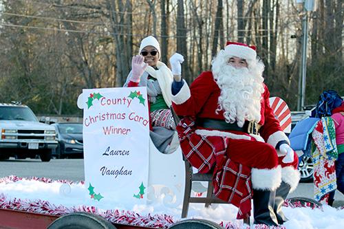 Santas sleigh brings up the rear in the annual parade which took place on Saturday, December 7th. Photo by Madison Bailey.