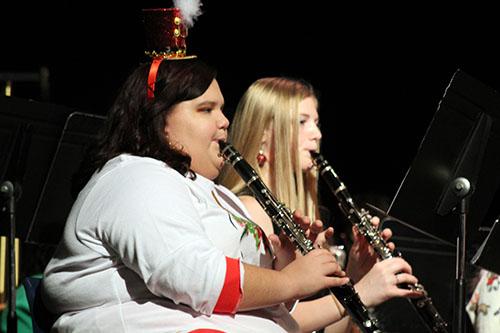 Senior Jordan Nugent performs in her last winter concert at PGHS. Nugent has been a part of the band and a Royal Marcher for three years. 
Photo by Haley Skalsky.