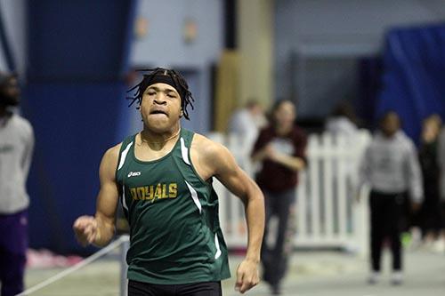 Junior Jaden Hines pushes himself to get his fastest time possible in the 300 meter run. He finished with a time of 42.78 seconds. Photo Chandler Coleman.