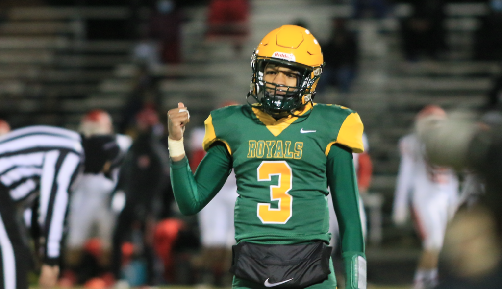 Quarterback Tahir Johnson looks to the sideline in the game against Matoaca to get the call. Photo by Helene White.